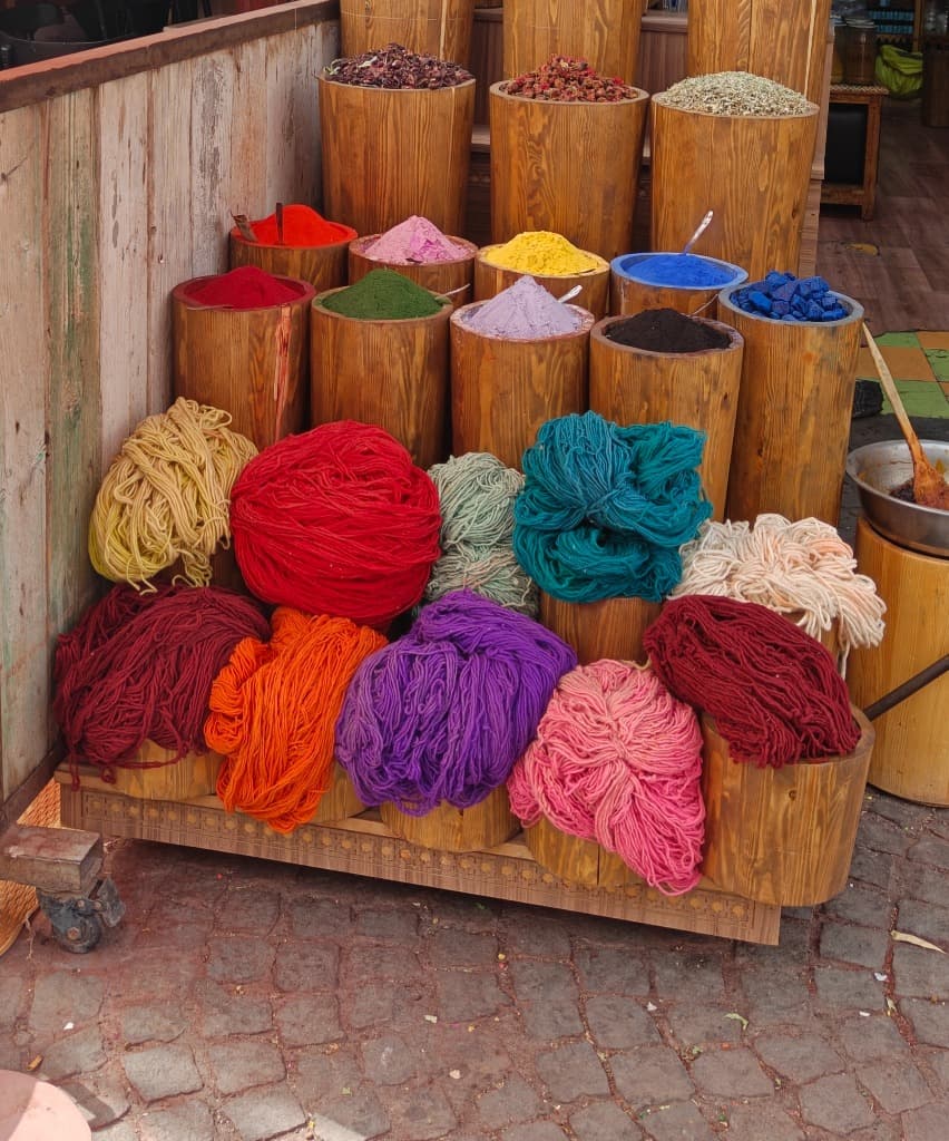 Artisanal dyes and yarn at the market
