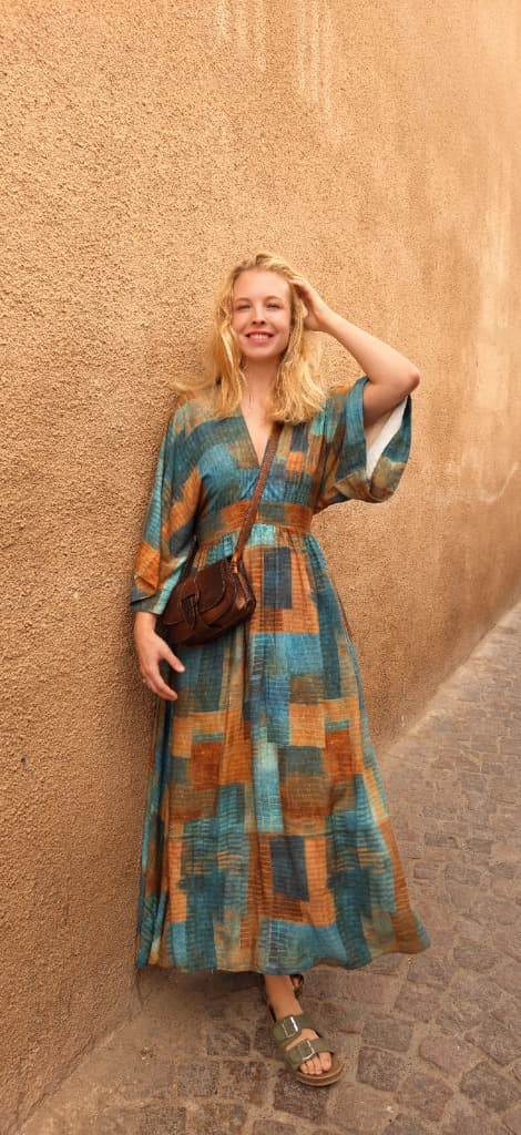 Woman in Medina wearing a patterned dress