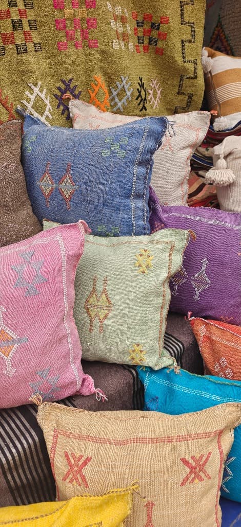 Stack of bright moroccan pillows